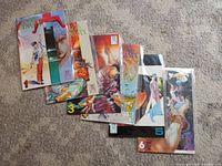 Photo showing all six Blood Sword Dynasty comic books, issues 1 to 6, laid out side by side on carpet, each in protective bags.