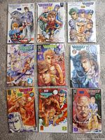 Front photo showing 9 issues of Drunken Fist comics from issues 1 to 9, all individually bagged and featuring colorful, detailed illustrated covers with martial arts themes.