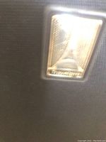 Close-up photo of the Travel-Pro Atlantic logo badge on the luggage.
