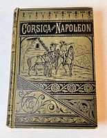 Front cover of the book showing title "Corsica and Napoleon" with illustration of two men on horseback and decorative patterning.