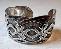 Front exterior view showing raised interlocking geometric pattern