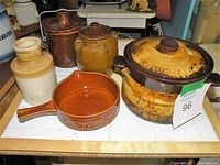 Full view of all four crockware pieces on tile counter.