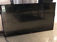 Front view of LG 48-inch flatscreen TV showing screen and bezel