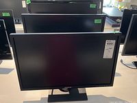 Front view of Samsung 24" monitor IP01 version, powered off, showing bezel and stand