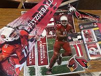 Four new packs of Larry Fitzgerald decals with Arizona Cardinals logos and NFL branding