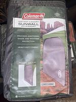 Photo of packaging showing Coleman branding and product details including size and features.