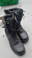 Pair of black Texas Steer motorcycle boots size 11, steel toed, shown from top.
