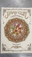 Full view of Jimmy Cliff concert poster with central mandala bird design and ornate border.