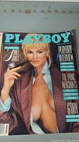Front cover of a Playboy magazine from early 1980s featuring Shannon Tweed with an open shirt and patterned jacket.