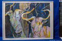 Full view of framed pastel painting depicting two bull heads with colorful, expressive strokes. The frame is silver and larger than painting.