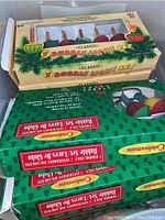 Two boxed vintage classic bubble light sets stacked with original packaging showing bright holiday colors and graphics.