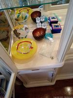 Photo showing Judaica lot with platters, bowls, clear tray, blue container boxes, and salt & pepper shakers