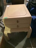 Oblique view of Lane side table showing two drawers and aged finish on top and front.