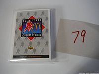 Initial image showing the front of the McDonald's All-Stars checklist hockey card in protective plastic.