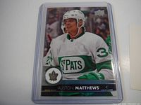 Front side of the Auston Matthews hockey card showing the player in St. Pats jersey.