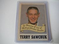 Front of Terry Sawchuk hockey trading card showing portrait and inscription.