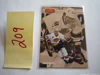 Front of 1992 Pinnacle Idols hockey card featuring Wayne Gretzky in action.