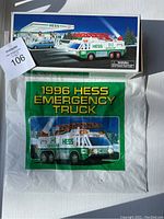Photo of the original Hess box and plastic bag with the 1996 Hess Emergency Truck label.