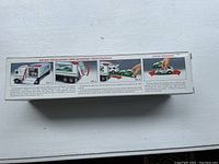 Box side with battery installation, light activation, and ramp operation instructions