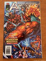 Cover of Avengers comic in Spanish, issue #13, featuring several Marvel superheroes.