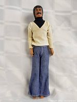 Full body photo of Mego Sonny Bono figure showing outfit and barefoot condition.