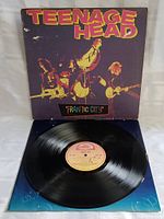Vinyl record of Teenage Head Frantic City album laid out flat showing the MCA Records label with album info.