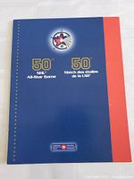 Front cover of hockey stamp set folder showing NHL 50th All-Star Game logos and Canada Post branding