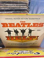 Close-up photo showing The Beatles 'Help!' original motion picture soundtrack album cover.