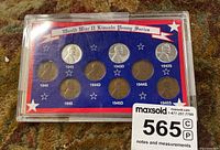 Full set of nine World War II Lincoln pennies dated 1943-1945 in a holder with patriotic star design and clear plastic cover