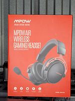 Front of MPOW AIR Wireless Gaming Headset box showing product image and main features.