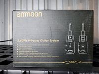 Photo of the front of the Ammoon branded box showing product name and features.