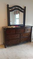 Front view of dresser with mirror
