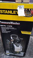 Box showing Stanley pressure washer details 1800 PSI 1.4 GPM with image of the product and features listed