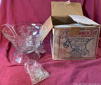 Full view of the punch bowl set including bowl, base, ladle, cups in plastic bags, and original box.
