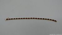 Bracelet laid out flat showing full length and design