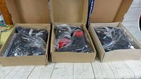 Three pairs of Dolomite alpine ski inner boots in original boxes, wrapped in plastic inside cardboard boxes.