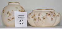 Two Mt. Washington rose bowls, showing the size, shape, and floral pattern exterior with pastel color tones and some loss of rim pearls.