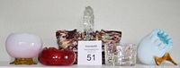 All five pieces of antique hand-blown glass miniature rose bowls and basket toothpick holders visible, showing variety of colors and shapes including the basket with handle.