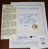 Certificate of Authenticity for the rhodolite garnet gemstone showing details including carat weight, color, cut, clarity, origin, and price per carat, signed by Paul H. Paulsen.