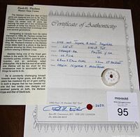 Certificate of Authenticity signed by Paul H. Paulsen with detailed handwritten gem specifications and origin information, plus the gemstones displayed on the certificate.