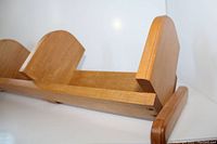 Side angle showing the wooden grain and thickness of the panels