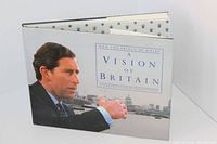 Photo showing the front cover of the hardcover book 'A Vision of Britain' by HRH The Prince of Wales featuring a photo of him in suit.