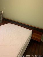 Headboard with black inlay and teak trim