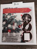 Photo of product packaging showing the 19ft Christmas string lights with snowflake shaped clear white LEDs and USB power details.