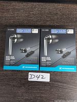 Front view of two boxed Sennheiser CX 2.00G earbuds with product branding and Samsung Galaxy compatibility noted