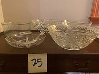 Side view showing bowl heights and design details including cuts and ridges.
