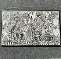 Full view of the black and white brass rubbing panel mounted on a black base, showing the Madonna and Child, Marguerite de Scornay, dragon and heraldry.