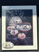 Full view of the framed print artwork showing the ancient ceramic pots in detail.
