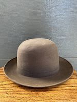 Front view of the brown vintage Emerson 5th Avenue fedora hat showing its dome-shaped crown and medium-wide brim.