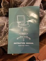 Instruction manual showing illustration of the office chair model HLC-1702F-5.